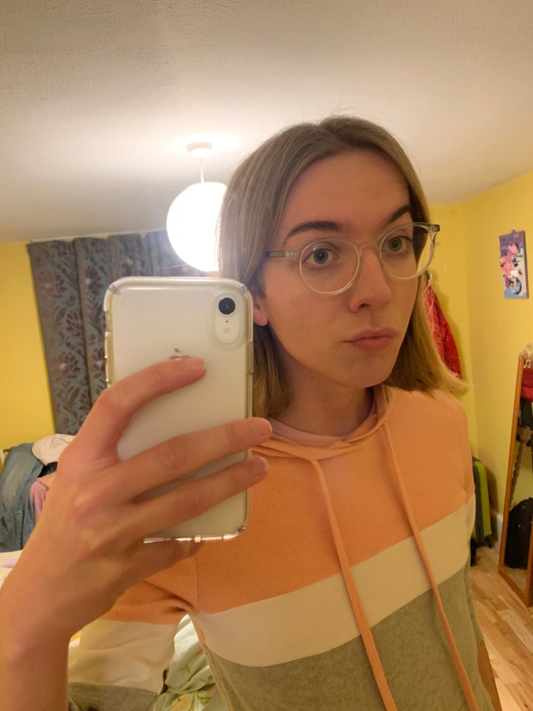 A selfie of Freya Onions in her yellow room